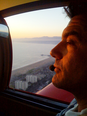 Palisadian Paulo Emanuele, flying his plane above the Los Angeles coastline.